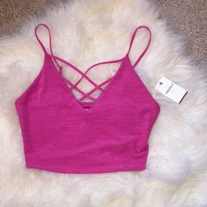 Neon pink strappy crop top